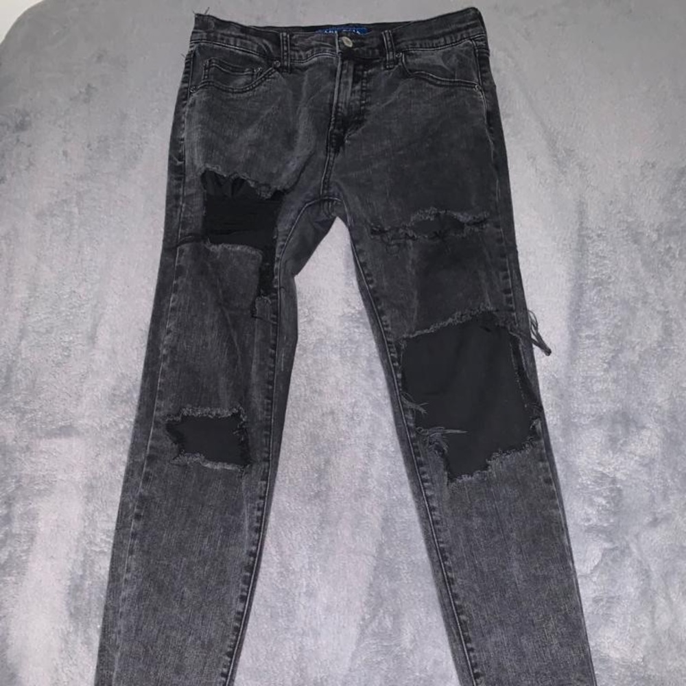 Mens skinny black washed out and ripped jeans